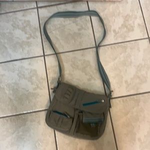 Bag with shoulder strap. Olive with teal details